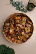 Confit de volaille, pommes de terre grenailles et carottes